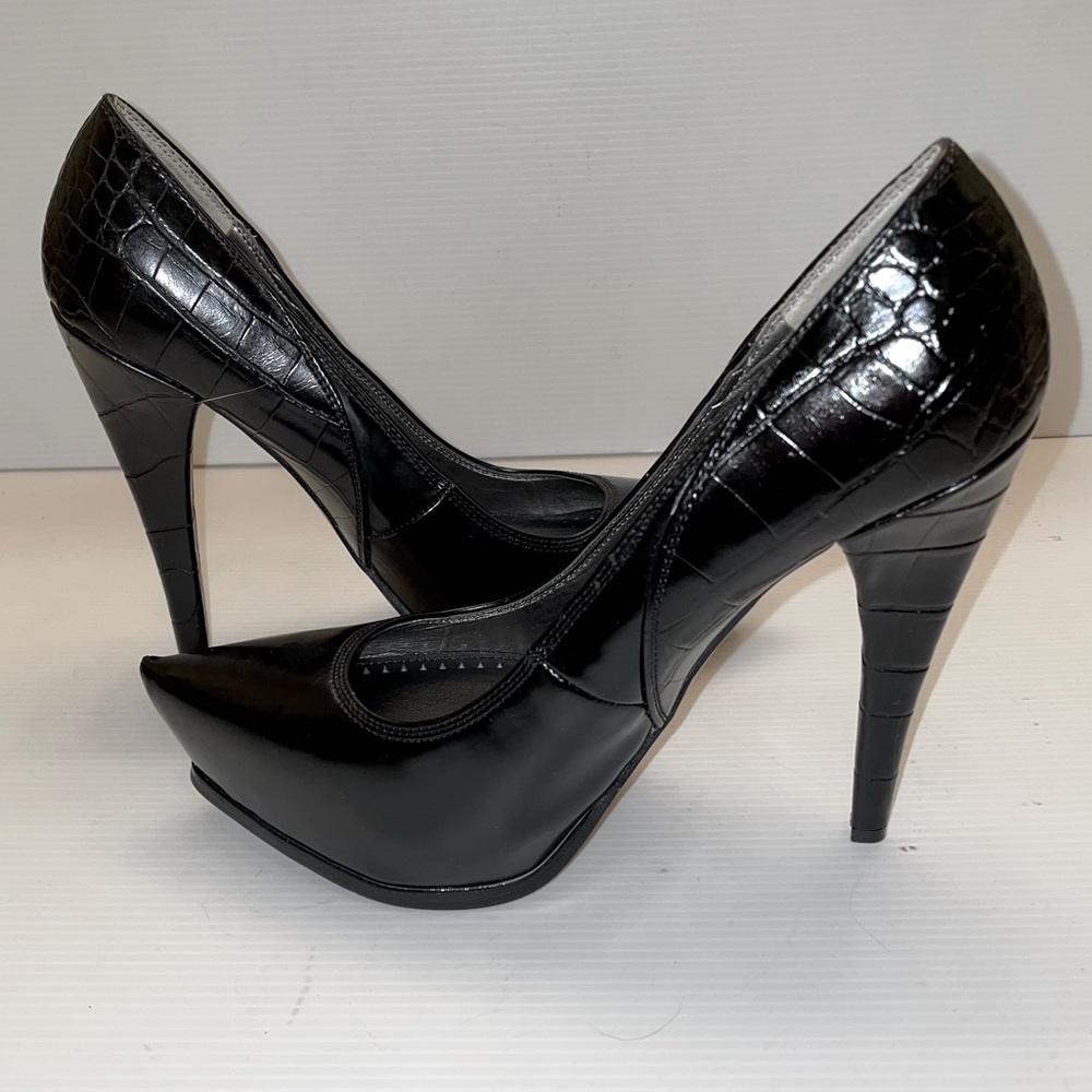 Circus by Sam Edelman Black Platforms with Animal print heel